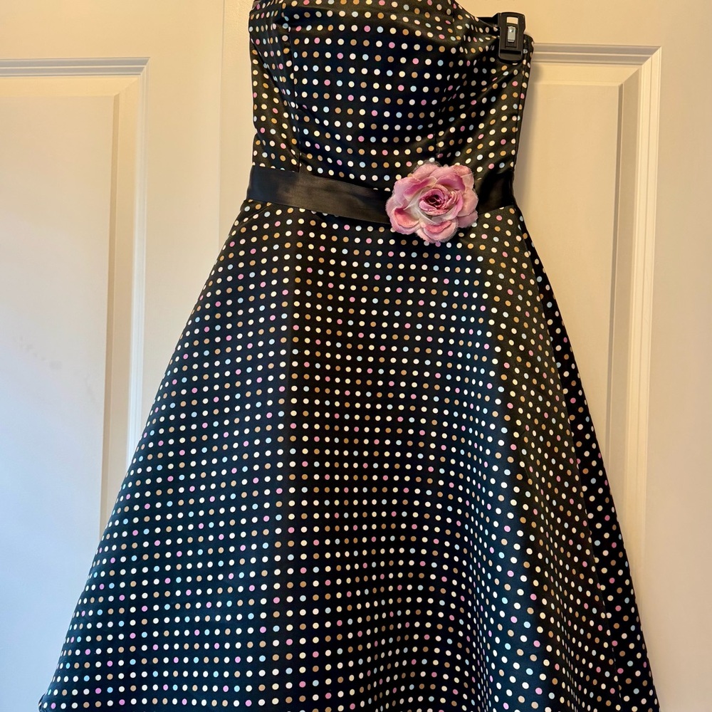 Women’s vintage style Polka Dot Fit-and-Flare Dress with Pink Flower Accent